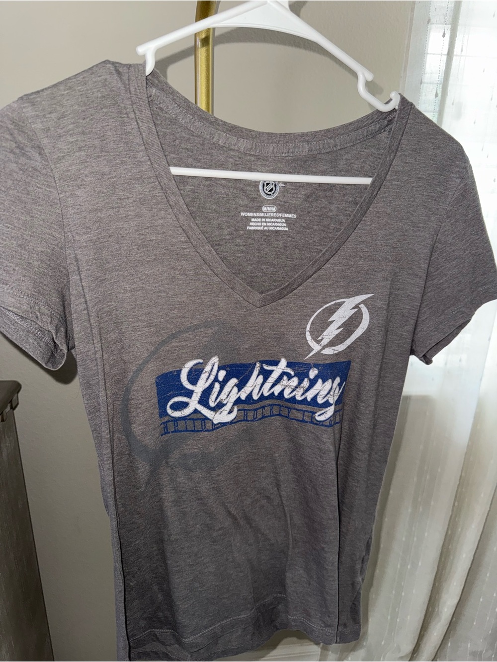 NHL Women's Gray V-Neck Tee with Team Logo
